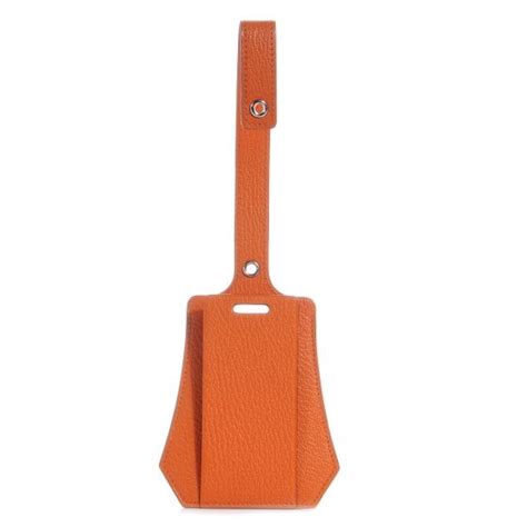 hermes luggage tag orange